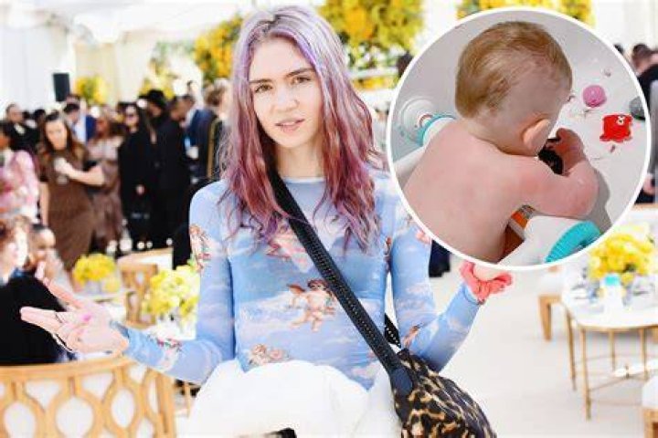 Grimes gives baby X AE AXII his first haircut